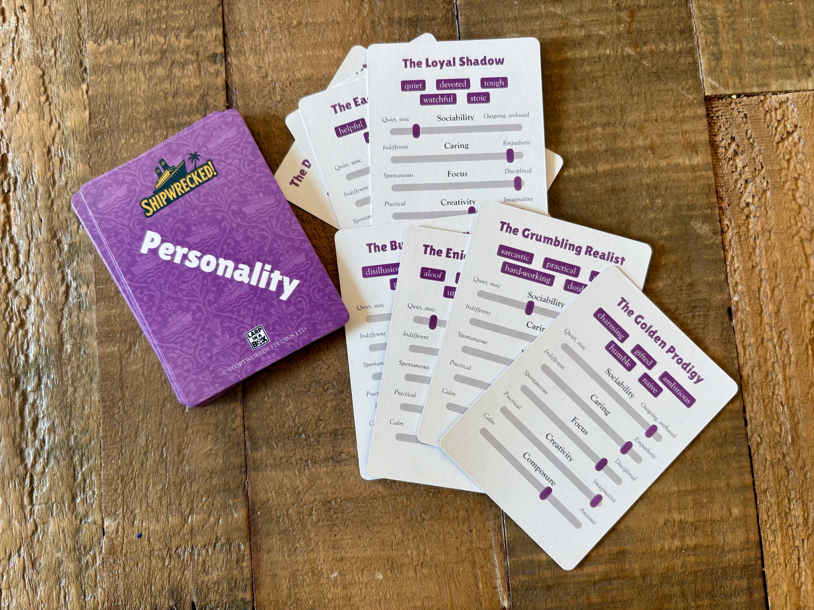 Shipwrecked Personality cards showing character trait sliders